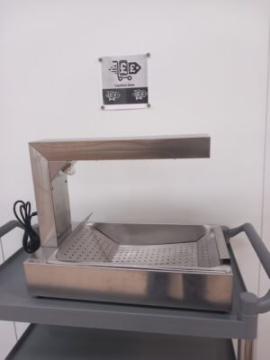 Side view of a Chip Scuttle showing the sleek design with the heating element visible underneath the chip holding area.