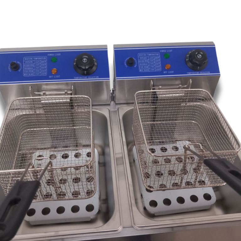 removable oil tanks from commercial fryer being cleaned